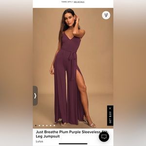 Purple jumpsuit with slits on both legs. Tie for the waist.